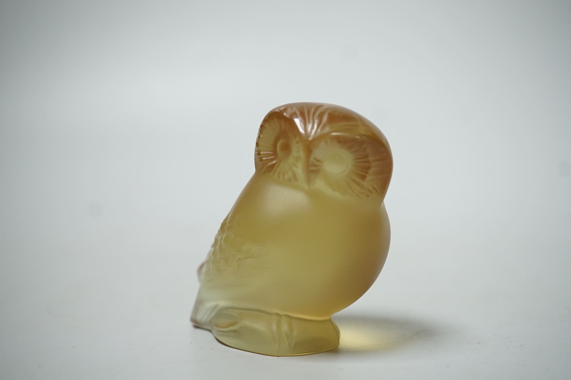 A small Lalique frosted amber crystal figure of an owl, 5.5cm